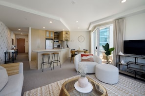 Deluxe Apartment | Living area | Flat-screen TV - The Beaumont Apartments (Tauranga)