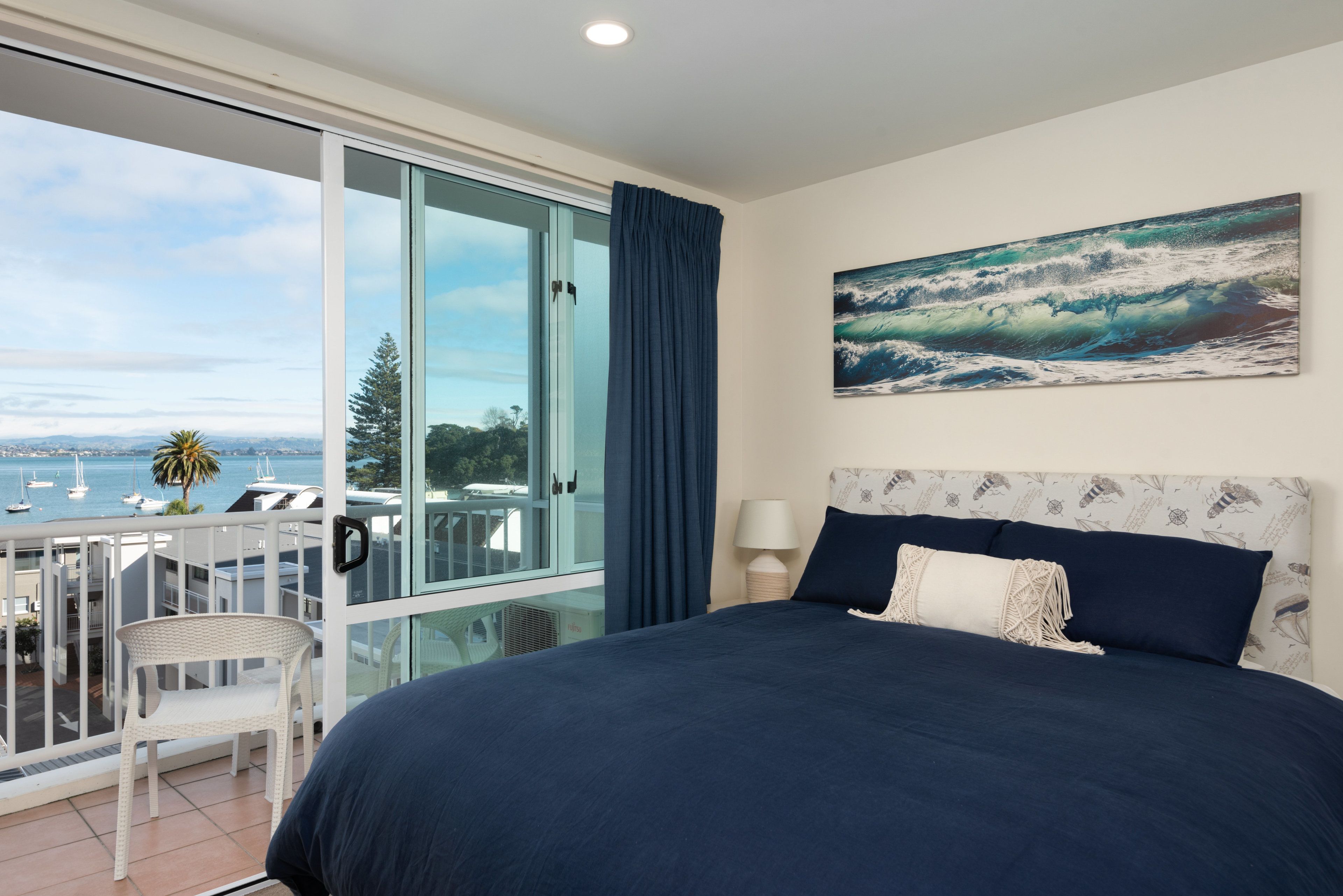 one bedroom harbour view apartment | premium bedding, individually decorated, individually furnished