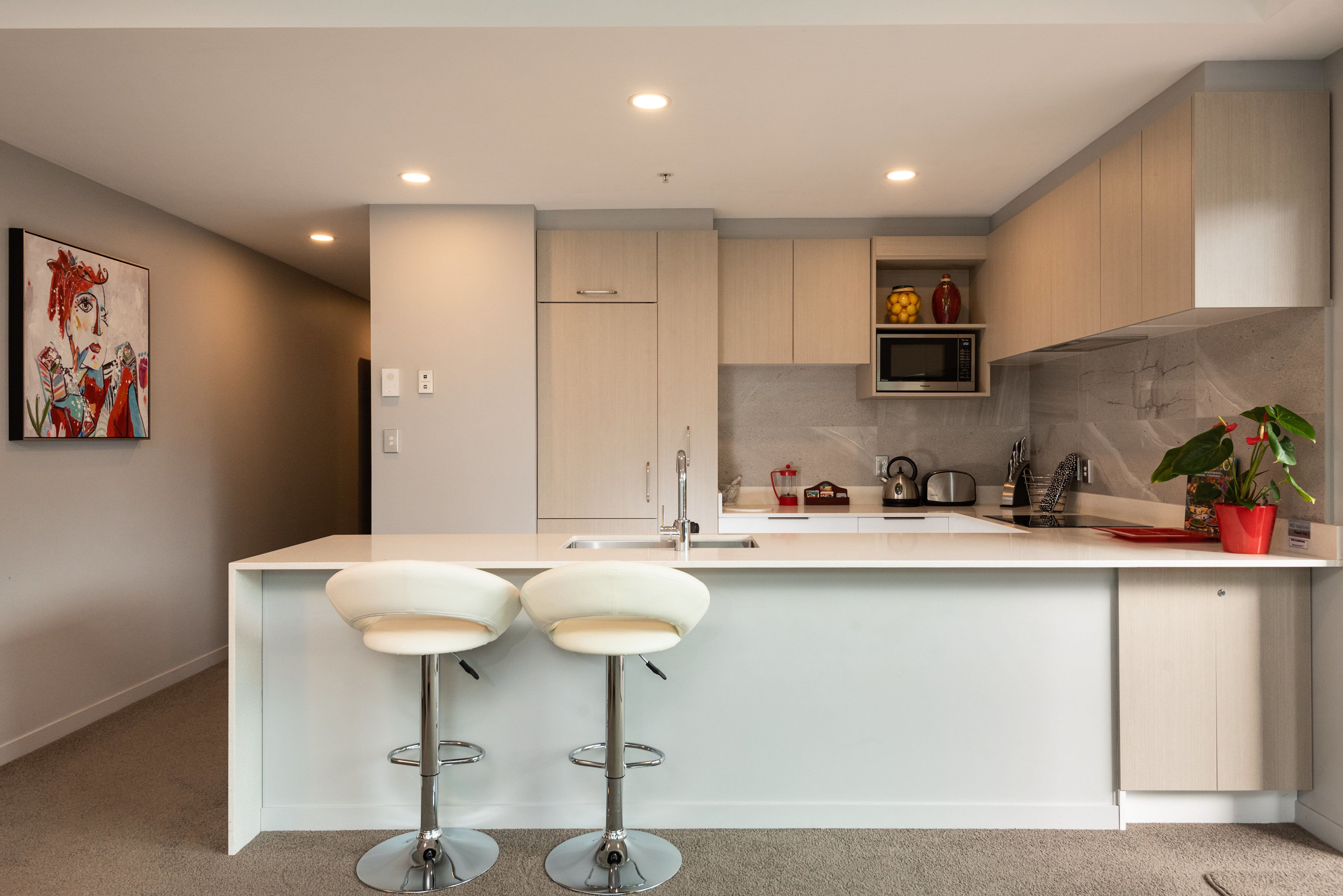 one bedroom courtyard apartment | private kitchen | full-sized fridge, microwave, oven, stovetop