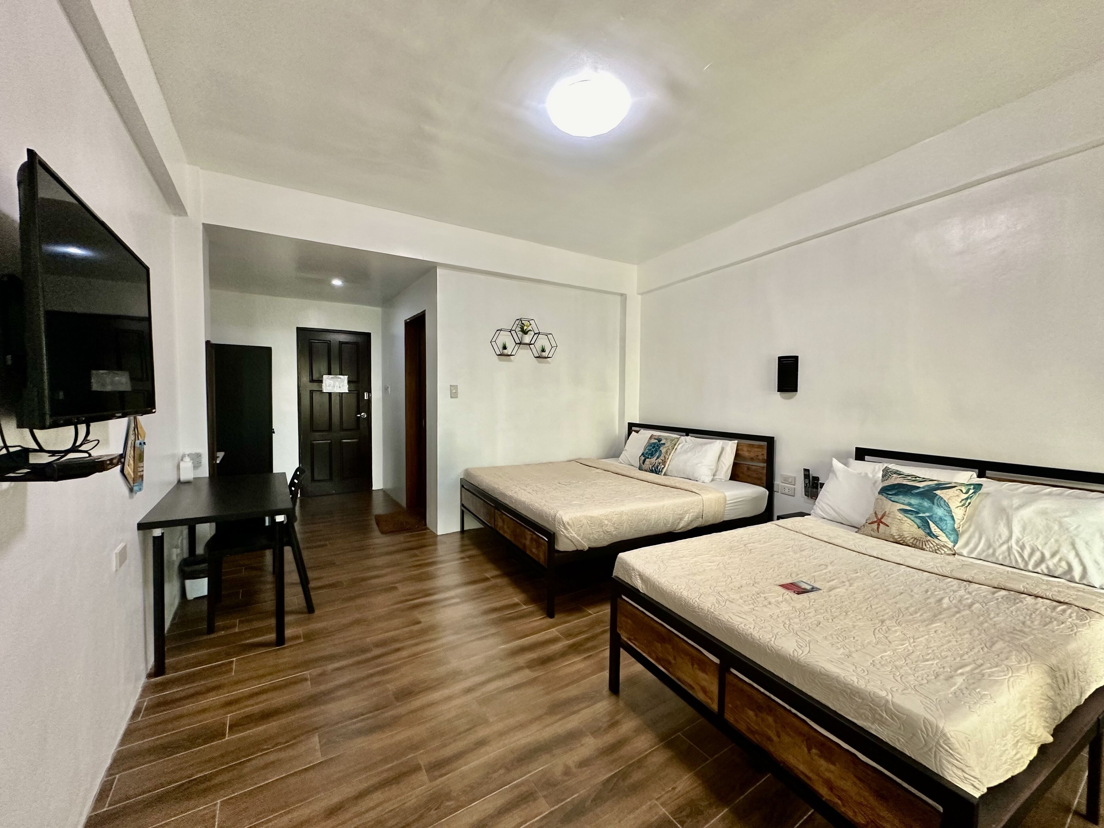 Deluxe Room with Balcony | In-room safe, desk, free WiFi, bed sheets