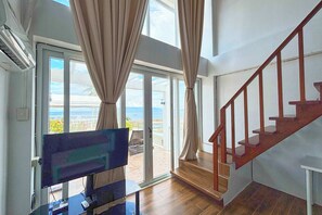 Villa | Living area | 32-inch flat-screen TV with cable channels, TV - Arkipelago Divers and Beach Resort (Puerto Galera)