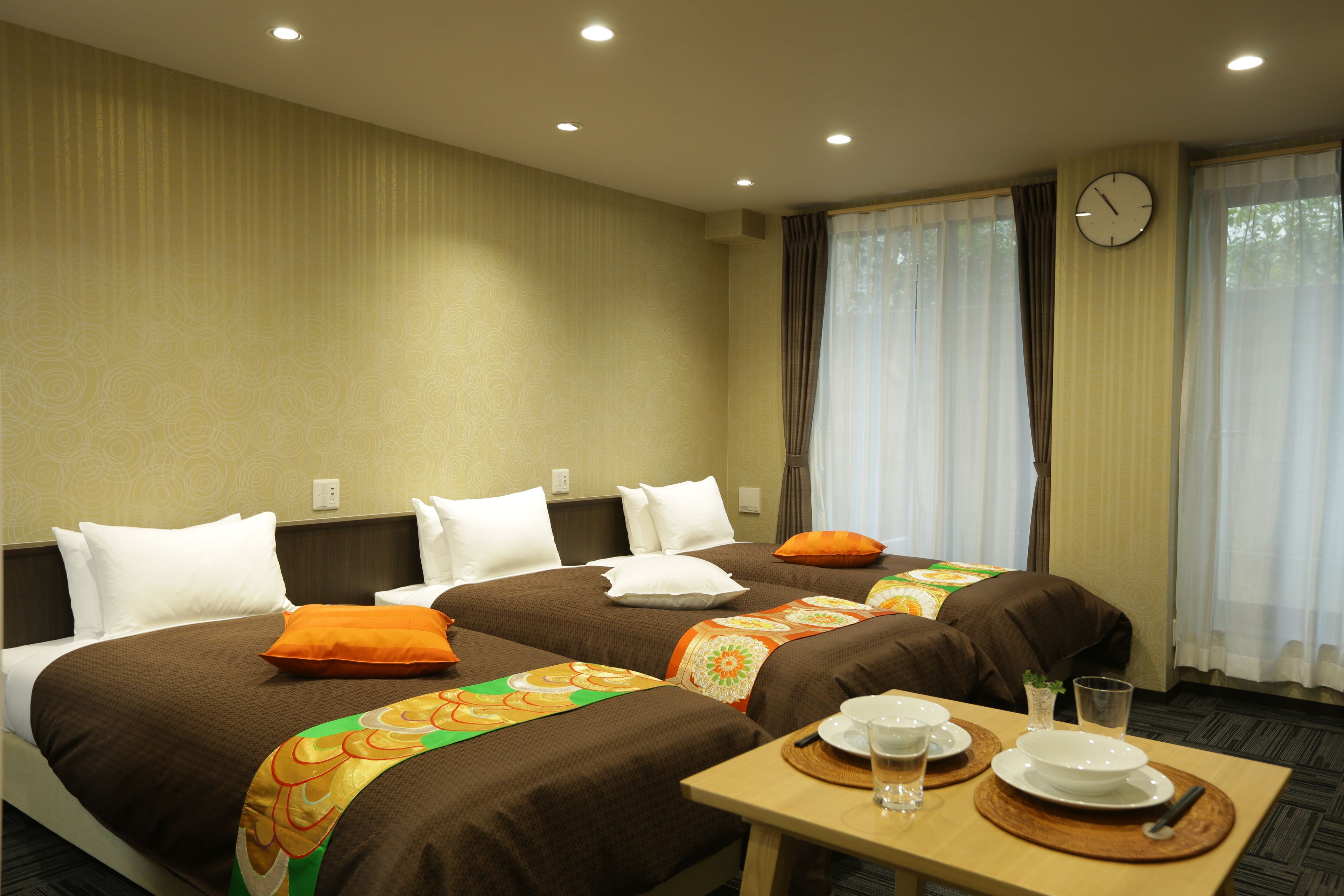 Japanese Sty. Connecting Rooms (1 Room with 3 Single Beds and 1 Room with 2 Single Beds and 1 Futon) | Living area | Flat-screen TV