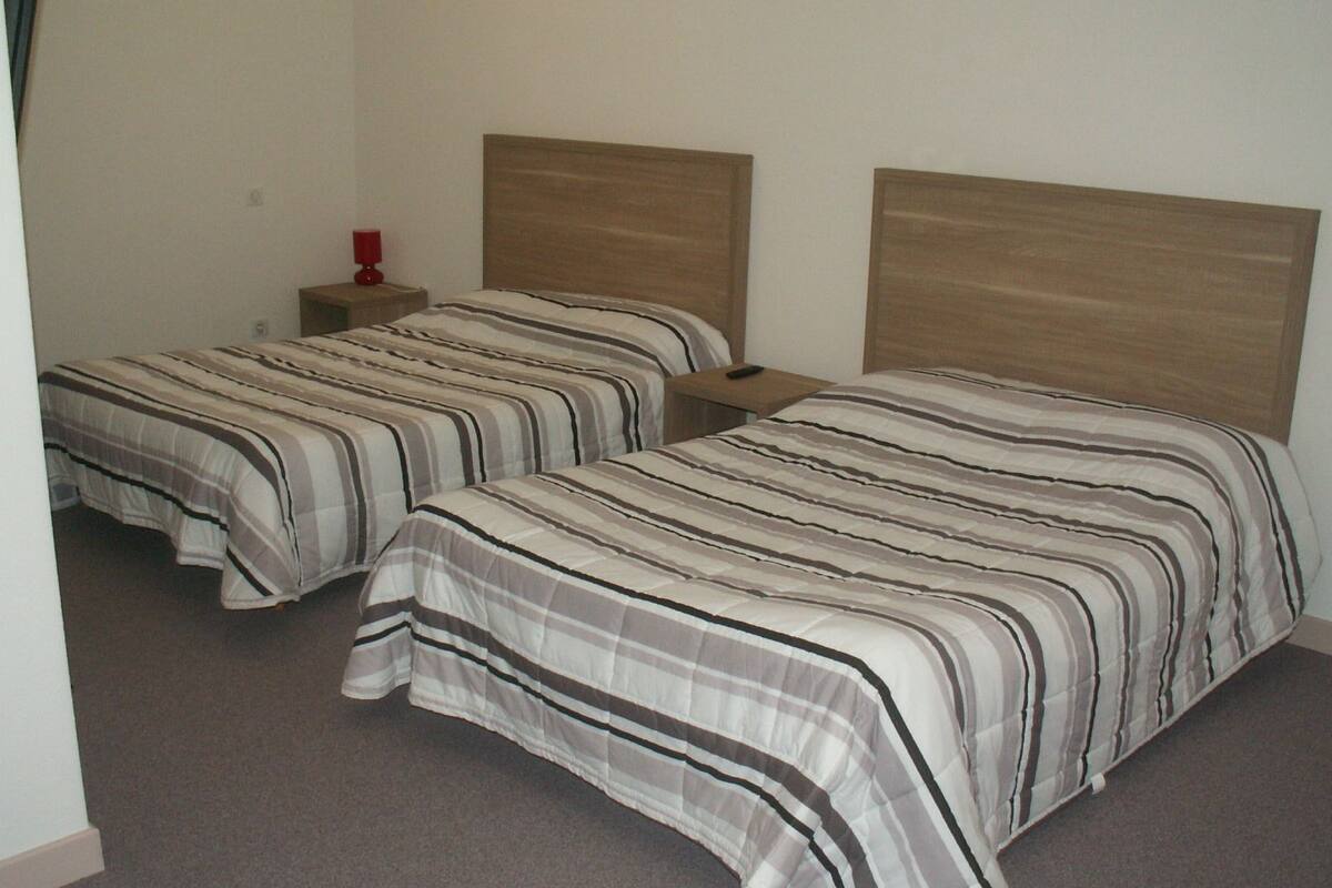 triple room | individually decorated, individually furnished, desk, blackout curtains