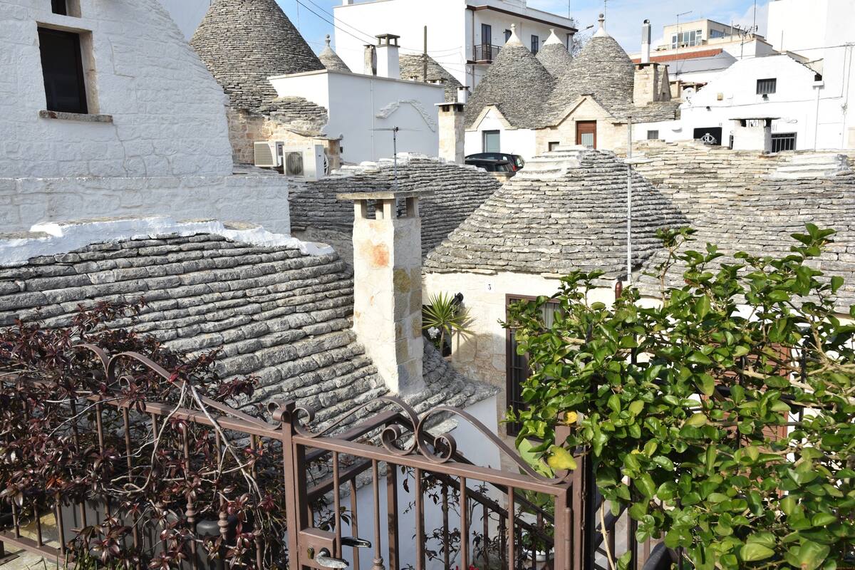 A traditional village with stone houses and a narrow street.