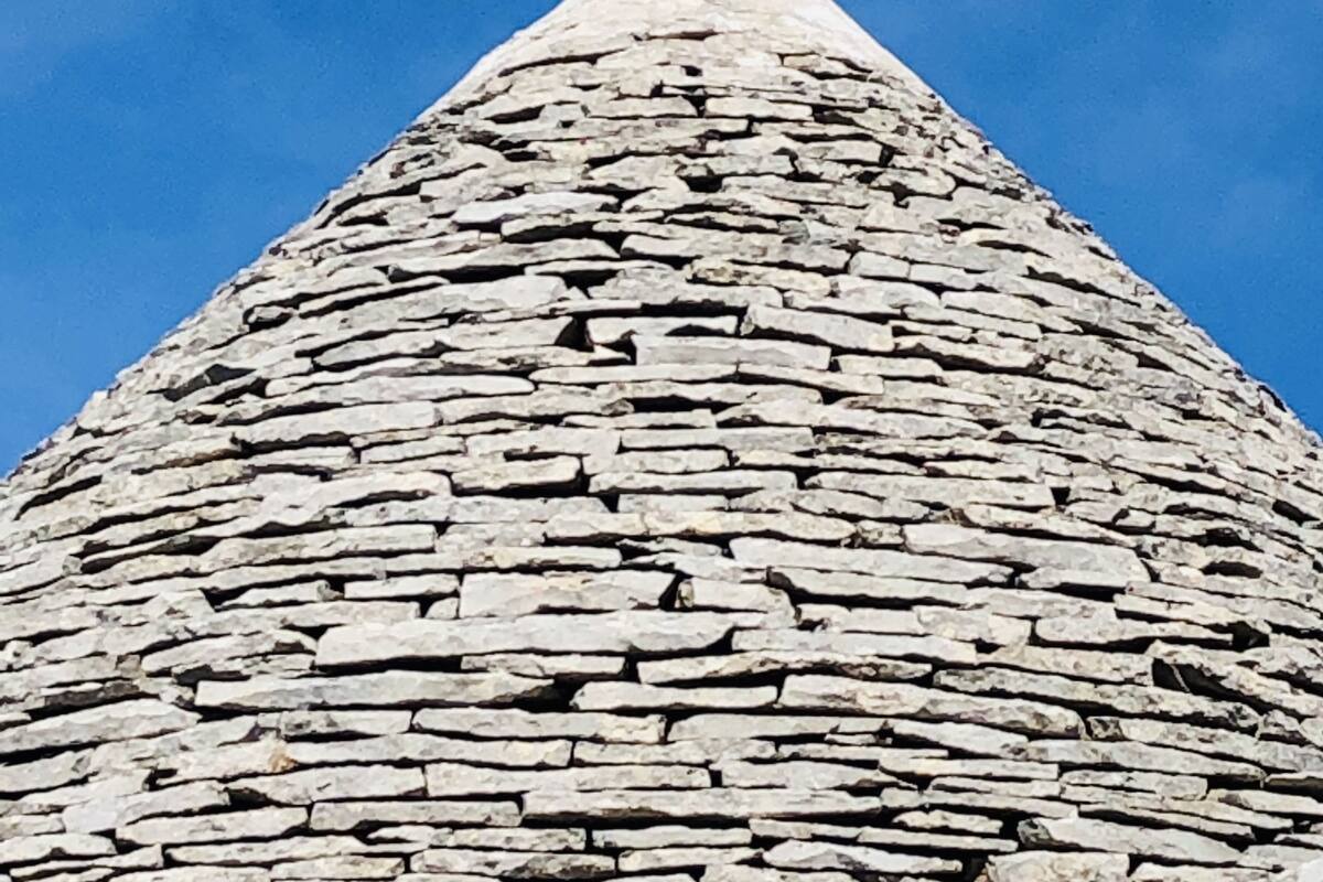 A stone structure with a star-shaped top.