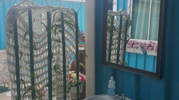 Family Room with Pool View | Bathroom sink