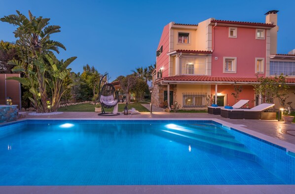 Seasonal outdoor pool, pool umbrellas, pool loungers