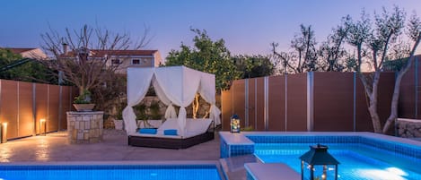 Seasonal outdoor pool, pool umbrellas, pool loungers