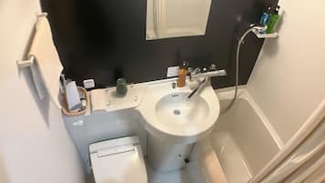 Double Room (No Daily Cleaning) | Bathroom | Combined shower/tub, free toiletries, hair dryer, bathrobes
