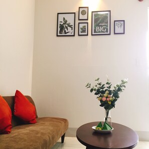 Family Apartment, 2 Bedrooms | Living area | 40-inch Smart TV with cable channels, TV - Your Home (Quy Nhon)