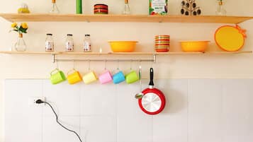 Family Apartment, 2 Bedrooms | Private kitchen | Full-sized fridge, stovetop, electric kettle, cookware/dishes/utensils