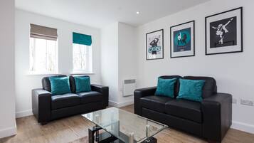 Deluxe Apartment, 2 Bedrooms | Living area | Flat-screen TV