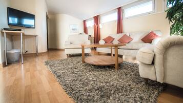 Deluxe Room | Hochwertige Bettwaren, Schreibtisch, Verdunkelungsvorhänge