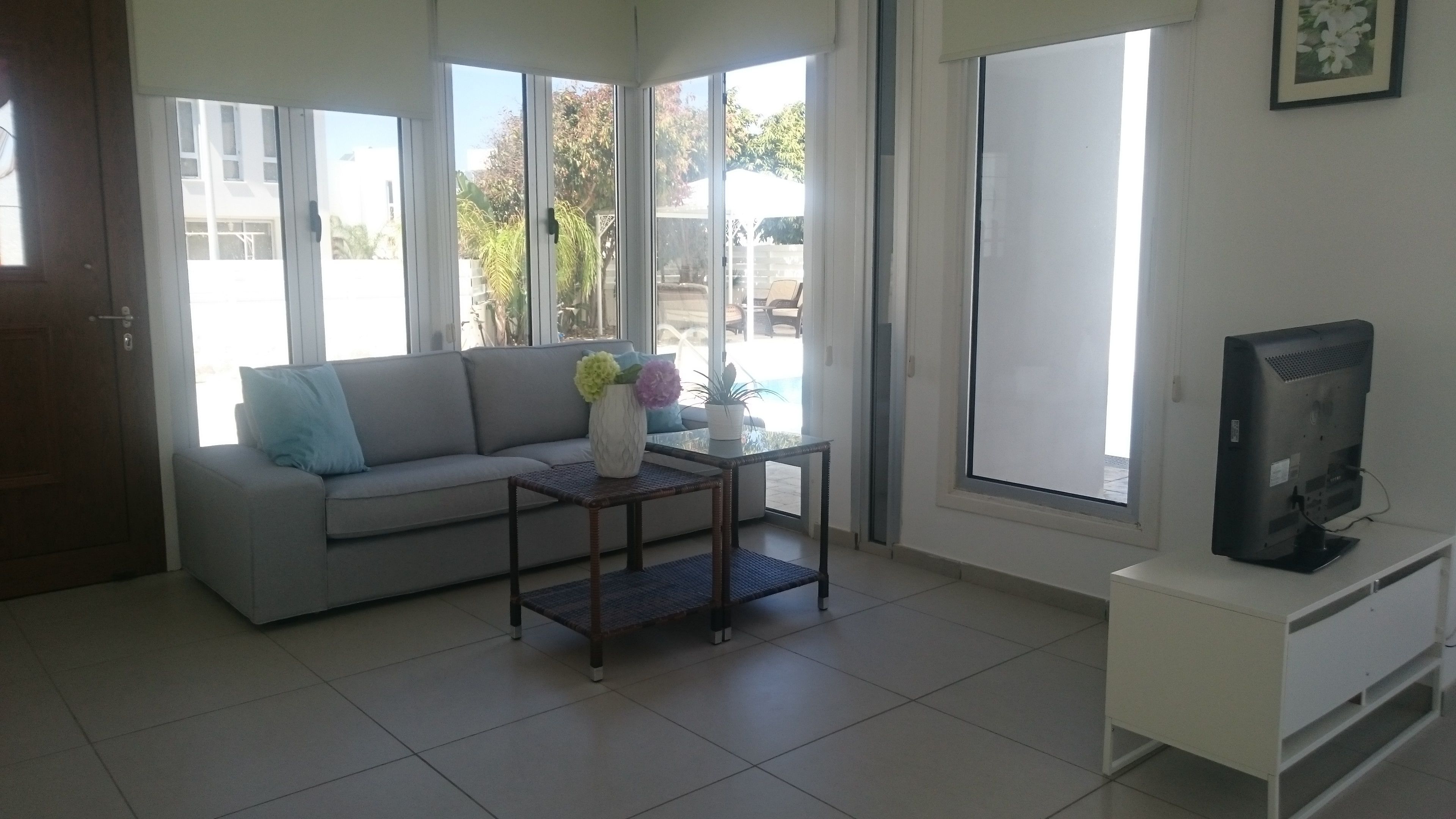 Standard-Villa, 3 Schlafzimmer, Poolblick, Poolseite | Wohnzimmer