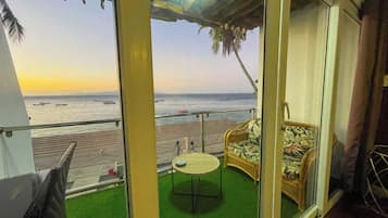 Deluxe Room, Beachfront | In-room safe, desk, rollaway beds, free WiFi