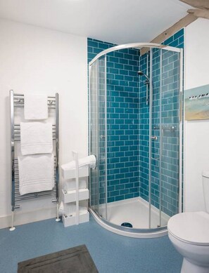 Shower, free toiletries, hair dryer, towels