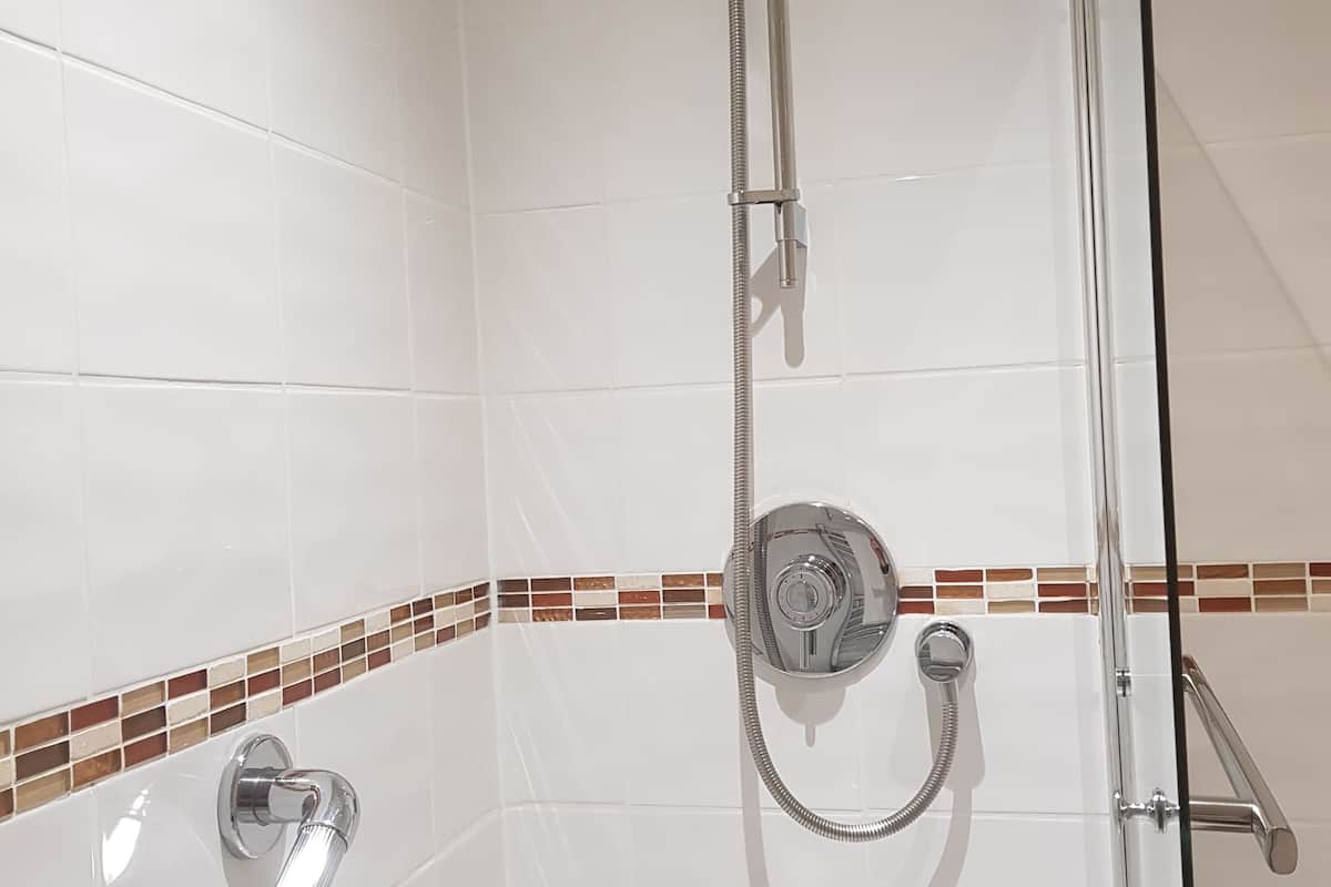 standard double room, 1 double bed | bathroom | separate bathtub and shower, eco-friendly toiletries, hair dryer, towels