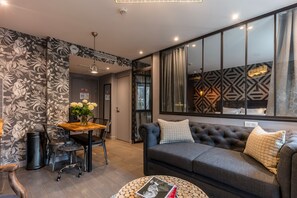 Apartment | Living area | 32-inch flat-screen TV with digital channels, TV - Be You Apartment (Paris)