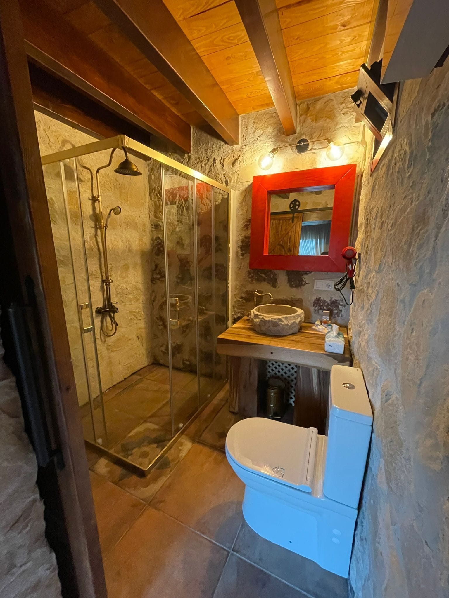 luxury bungalow | bathroom | shower, rainfall showerhead, designer toiletries, hair dryer