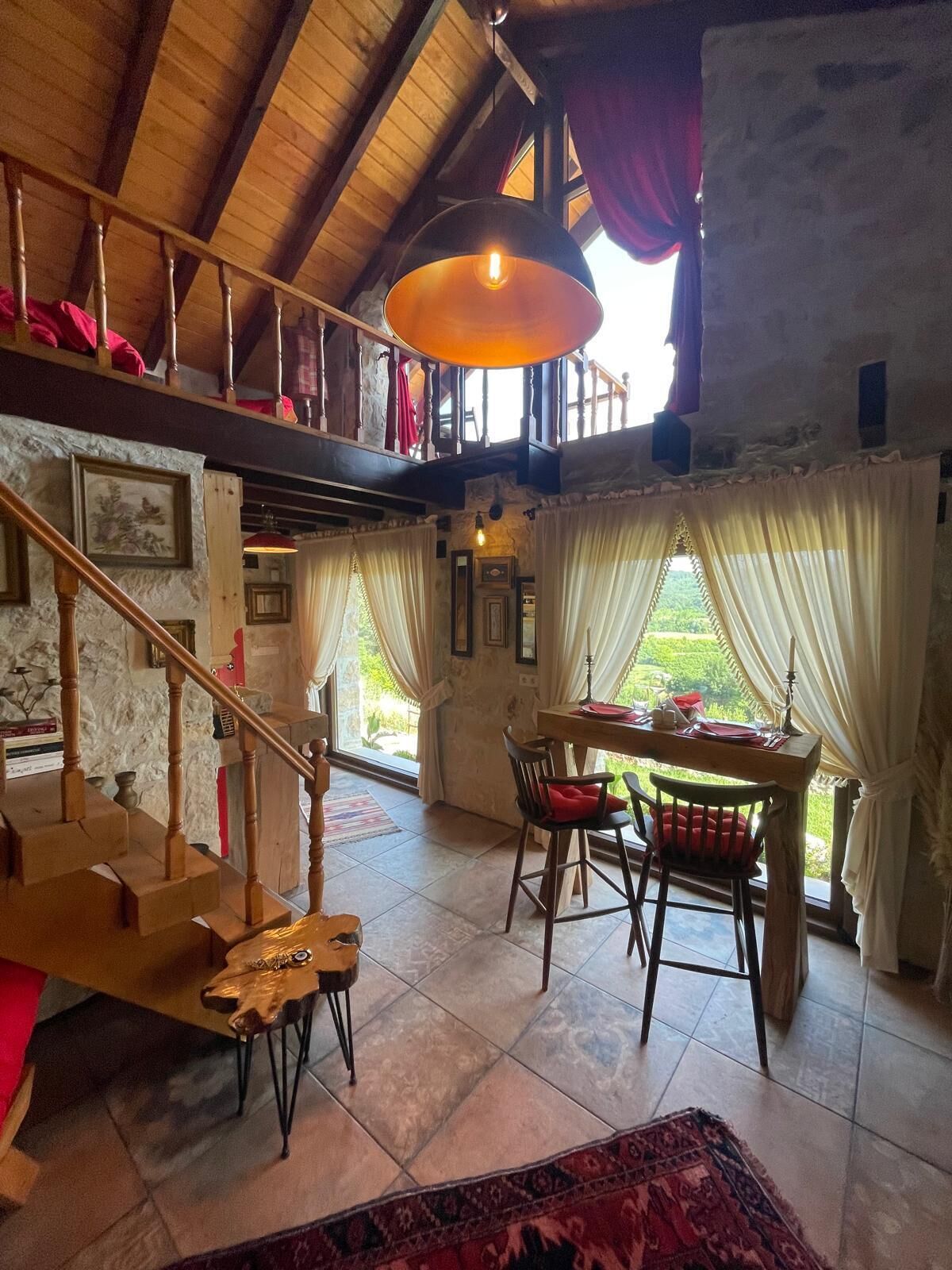 luxury bungalow | living area | 40-inch lcd tv with satellite channels, tv, fireplace