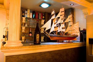 Deluxe Apartment, Sea View | Room amenity - Villa M (Bar)