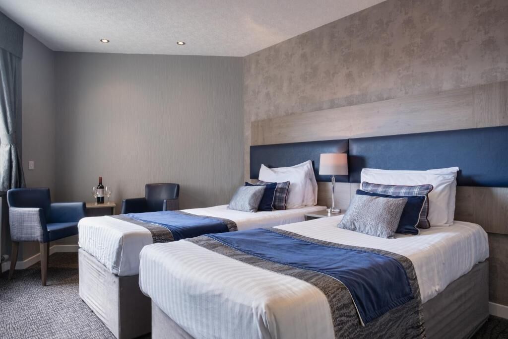 Twin Room | Desk, iron/ironing board, free WiFi, bed sheets