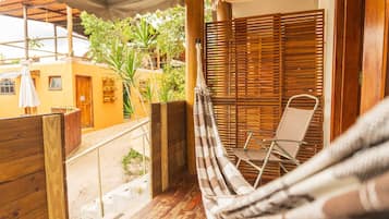 Deluxe Chalet, Balcony, Pool View | Living area