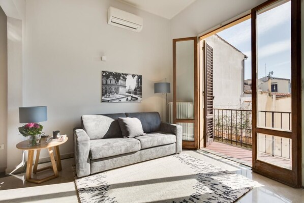 Apartment, 2 Bedrooms | Living area | Flat-screen TV
