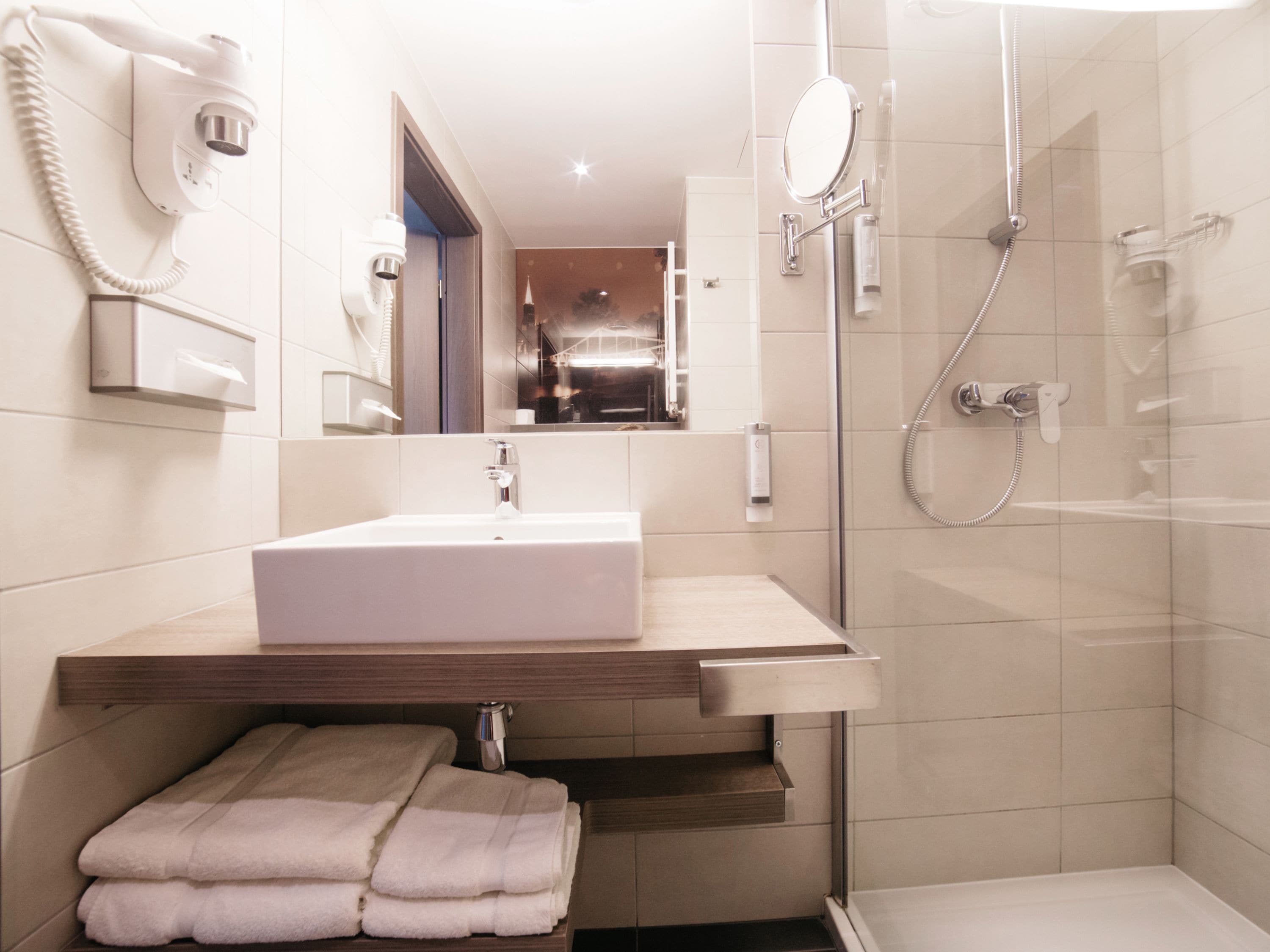 shower, free toiletries, hair dryer, towels