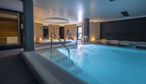 Indoor pool, outdoor pool, open 10:00 AM to 7 PM, pool umbrellas