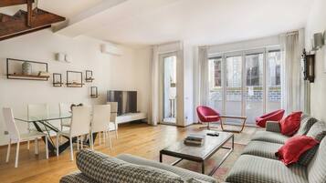 Apartment, 2 Bedrooms | Living room | Flat-screen TV