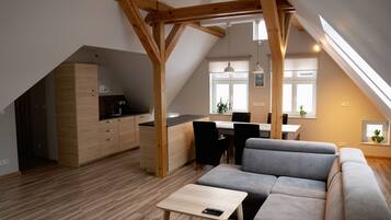 Exclusive-Apartment | Wohnbereich | Flachbildfernseher