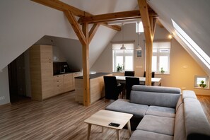Appartement Exclusif | Coin séjour | Télévision à écran plat