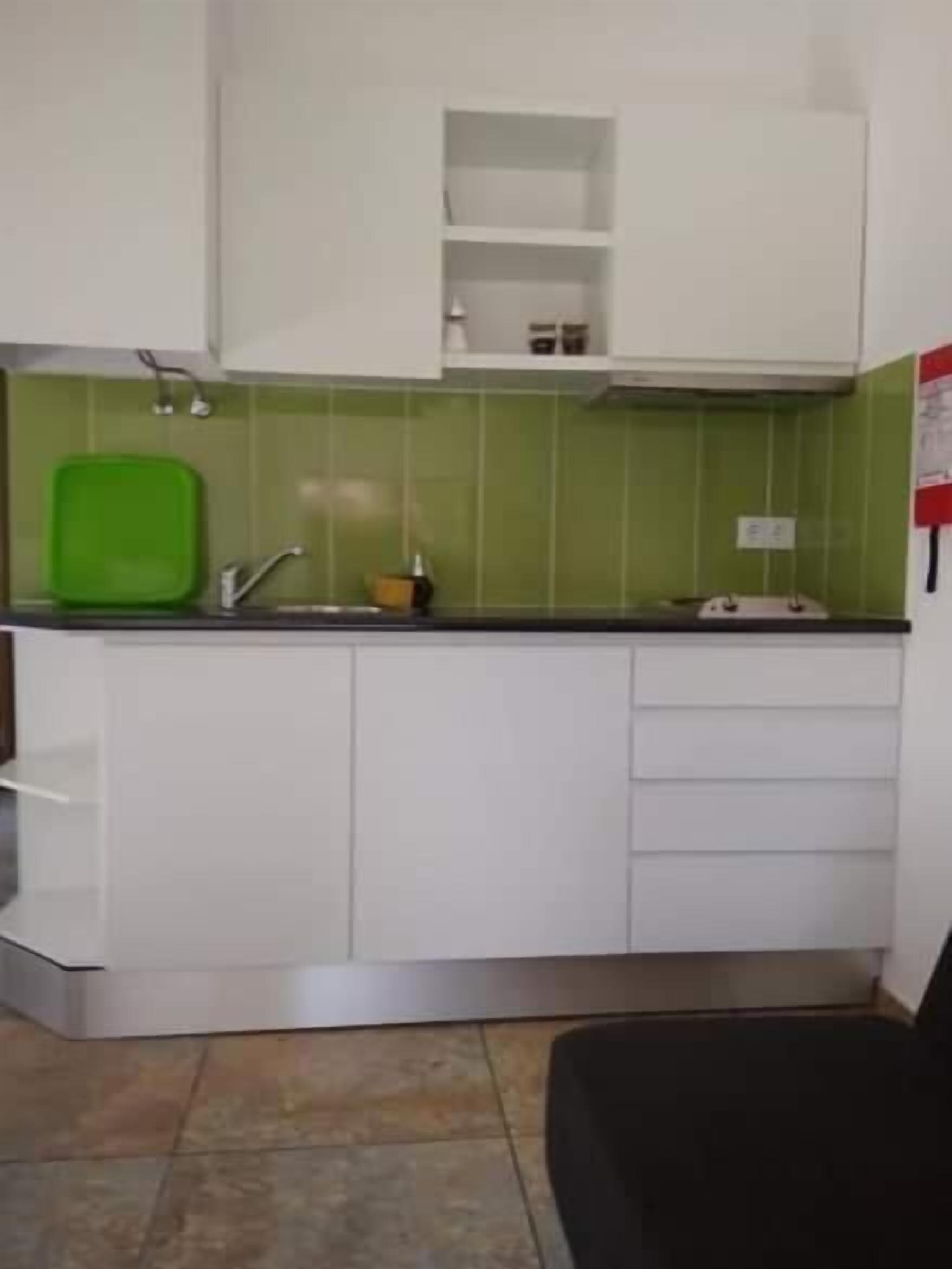 Fridge, microwave, stovetop, cookware/dishes/utensils