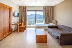 Triple Room, Balcony | Desk, laptop workspace, blackout drapes, iron/ironing board - Hotel Can Fisa (Corbera De Llobregat)