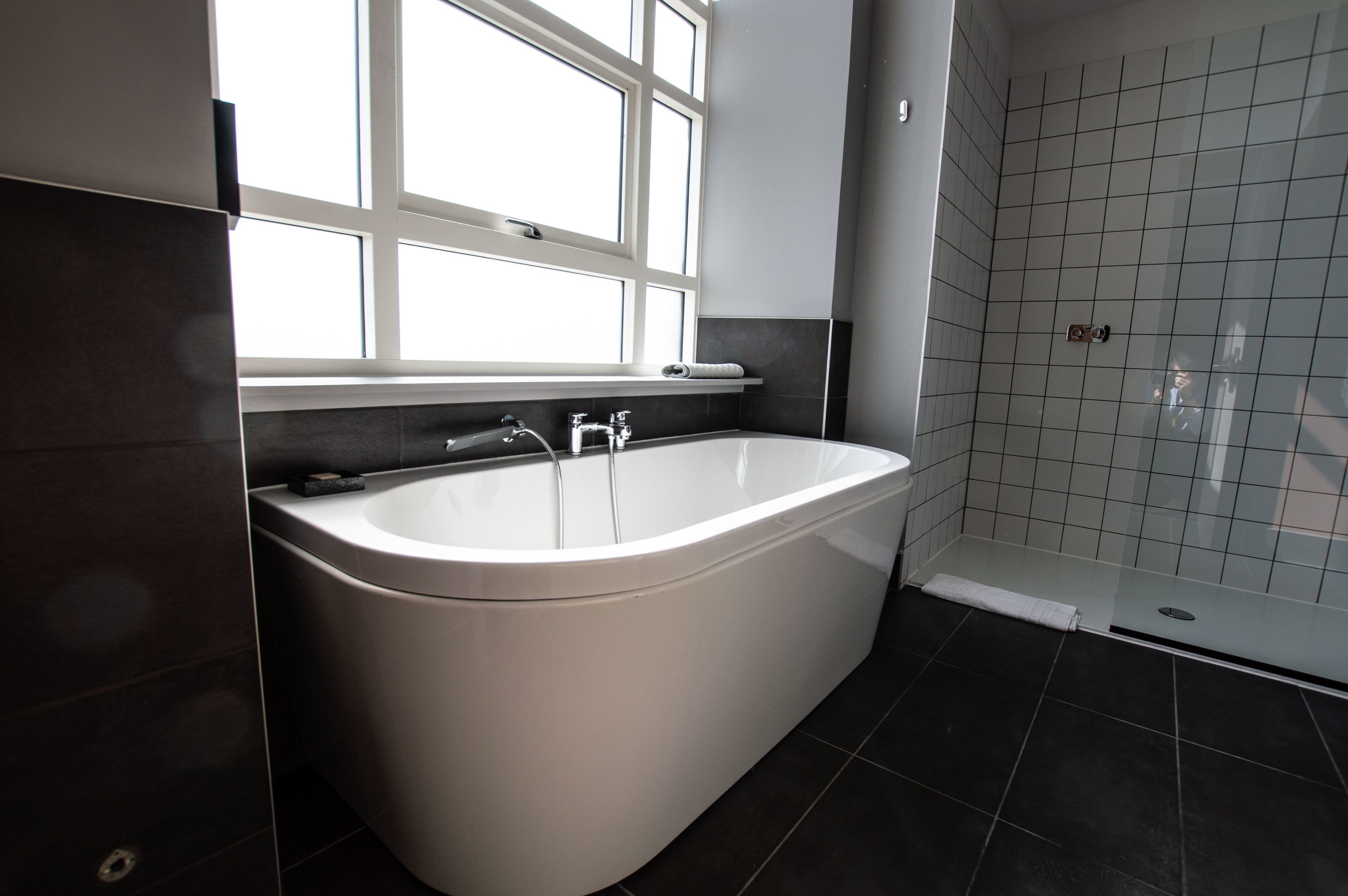 shower, rainfall showerhead, designer toiletries, hair dryer