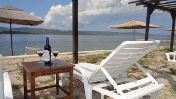 On the beach, free beach cabanas, sun-loungers, beach umbrellas