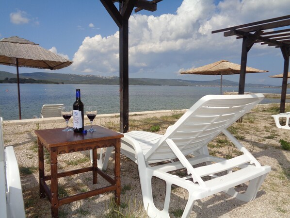 On the beach, free beach cabanas, sun loungers, beach umbrellas