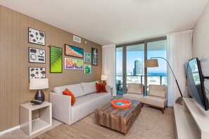 Condo, 2 Bedrooms, Ocean View (1704) | Living room | 49-inch flat-screen TV with cable channels, TV - Hyde Beach Condos by Ammos VR (Hollywood)