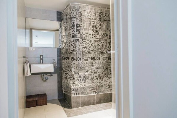 Apartment, 1 Double Bed with Sofa bed | Bathroom | Free toiletries, hair dryer, towels