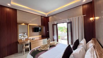 Deluxe Double or Twin Room, Pool View | 1 bedroom, in-room safe, desk, laptop workspace