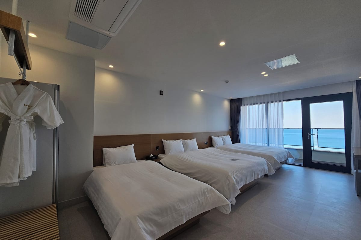 7. Family Triple Ocean | Down comforters, blackout drapes, soundproofing, free WiFi