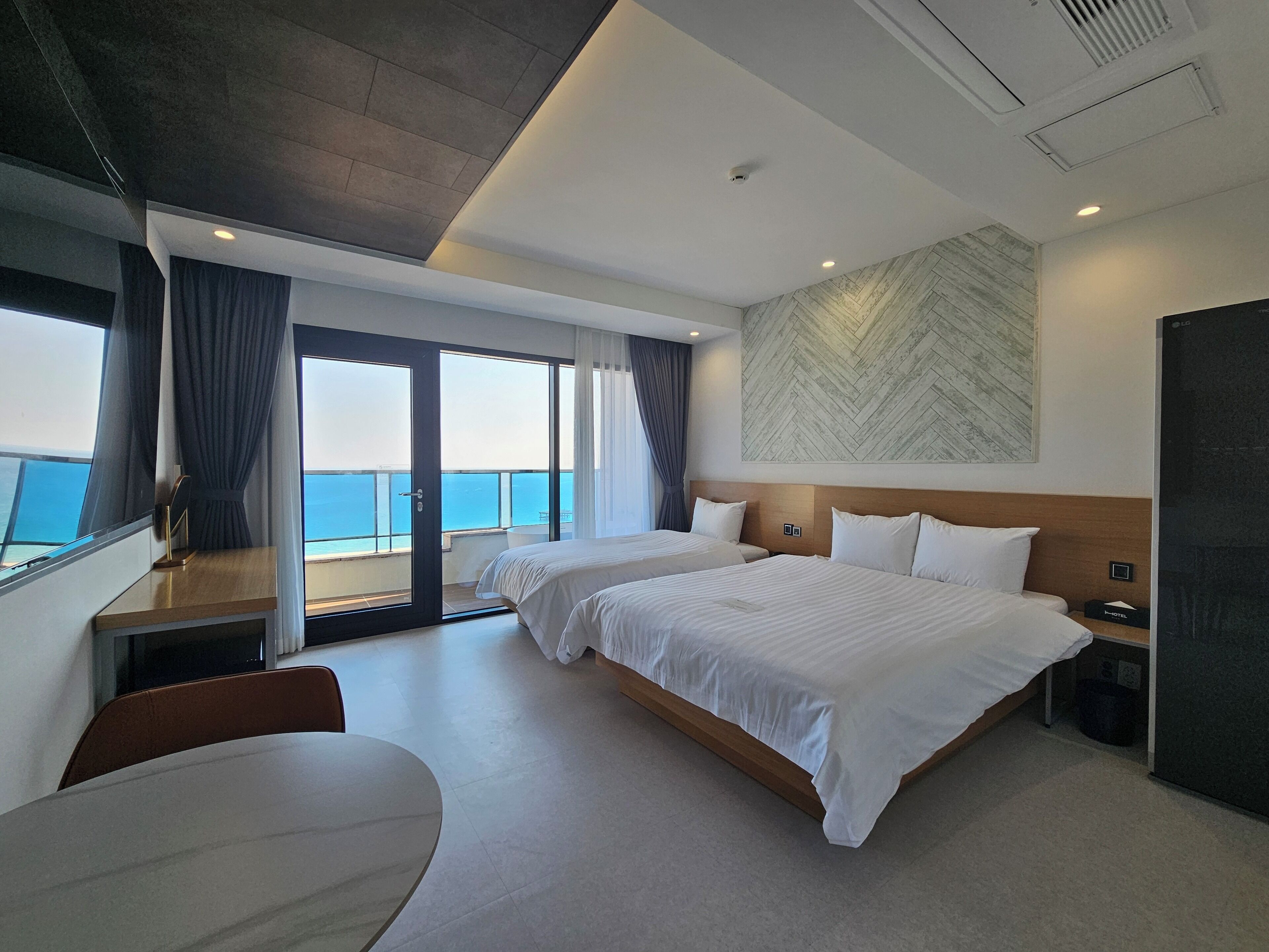 5. Deluxe Twin Ocean | Down comforters, blackout drapes, soundproofing, free WiFi