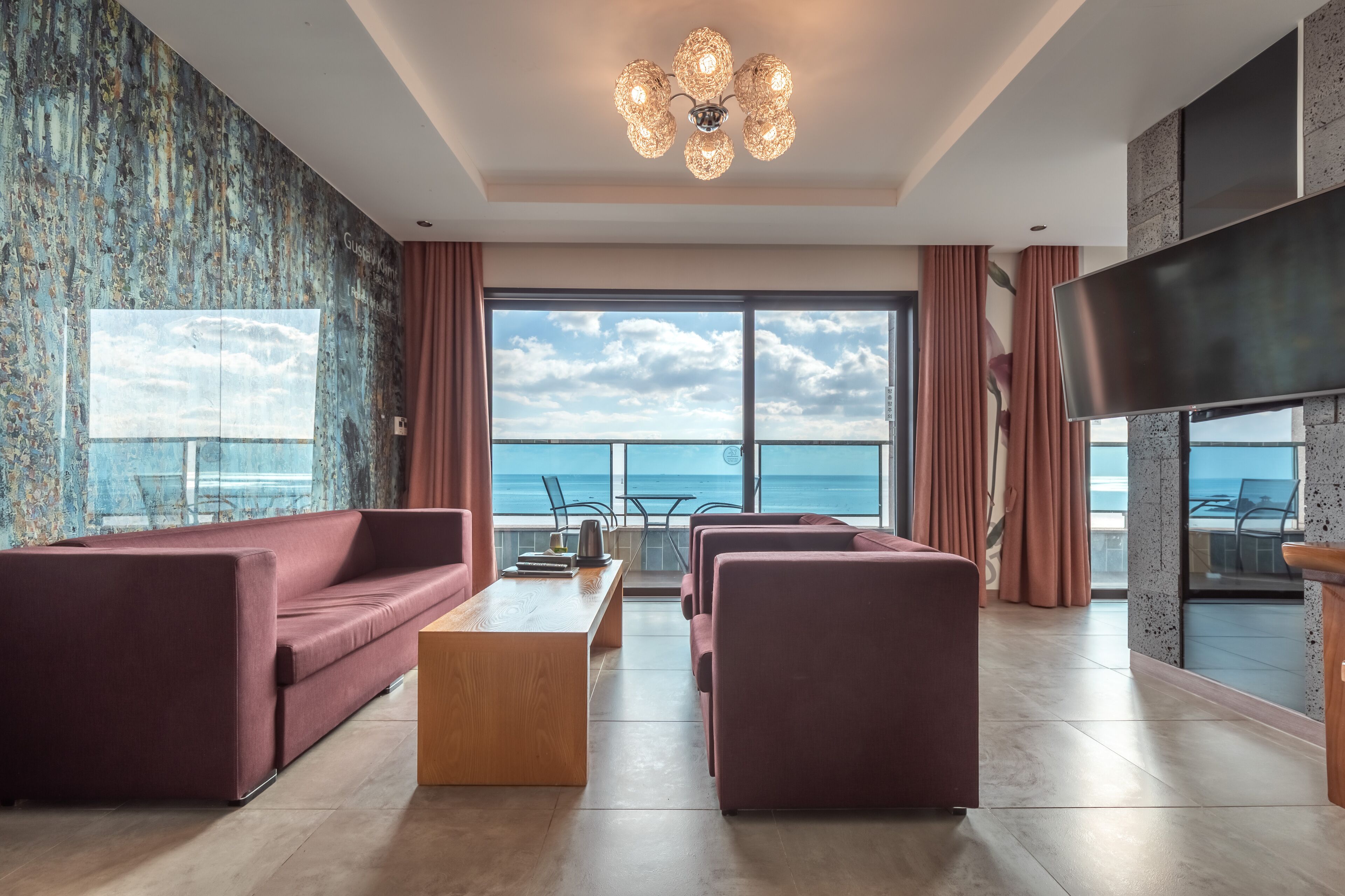 7. Family Triple Ocean | Living area | 65-inch Smart TV with digital channels, Netflix, streaming services