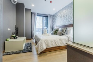 Apartamento, 1 quarto | 1 quarto, escrivaninha, cortinas blackout, ferros/tábuas de passar roupa