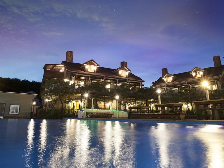 Seasonal outdoor pool, open 3:00 PM to 8:00 PM, pool umbrellas