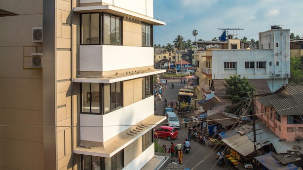 A multi-story building with a sign reading "Nuvana."