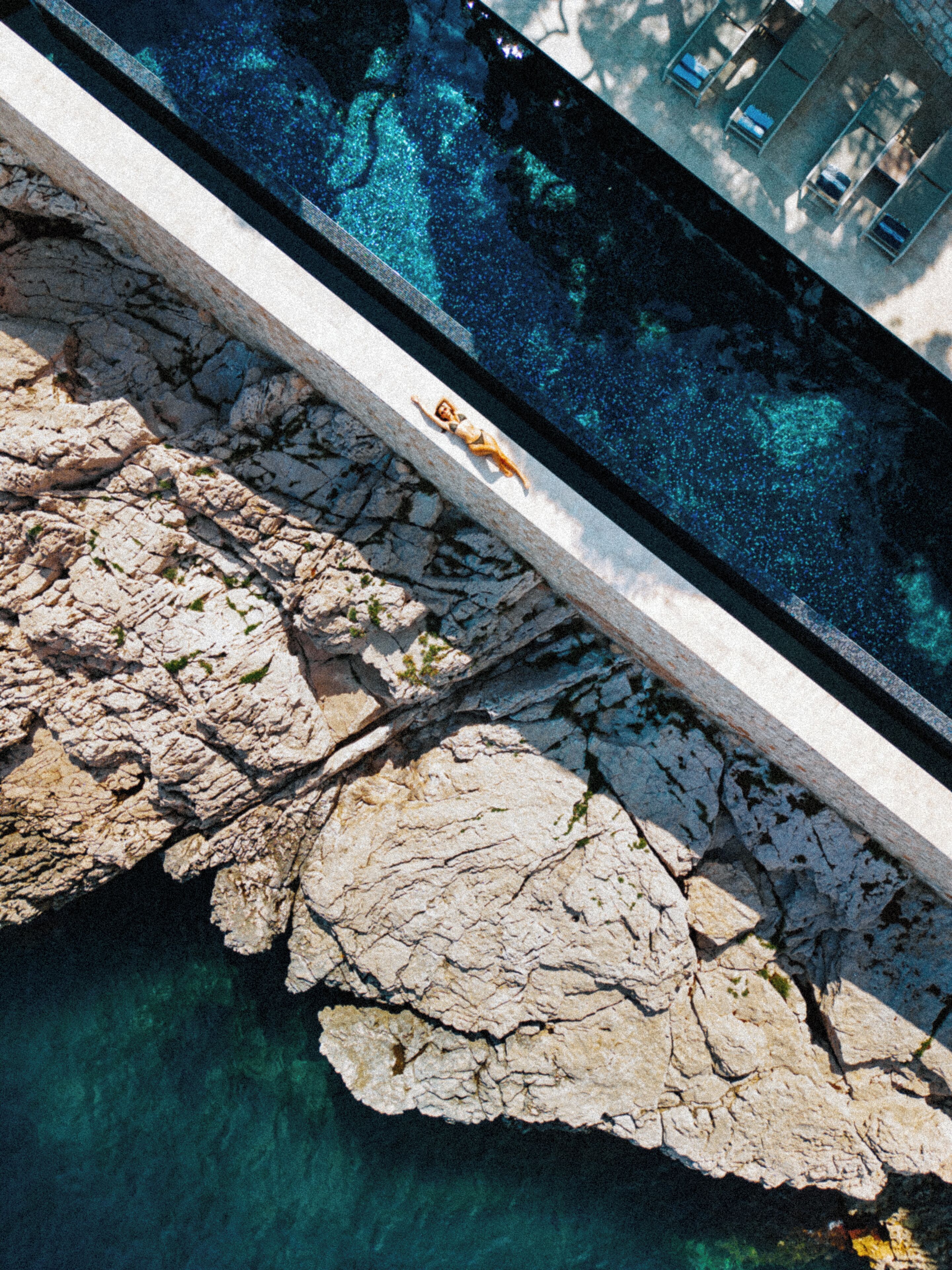 2 outdoor pools, open 9:00 am to 8:00 pm, pool umbrellas, pool loungers