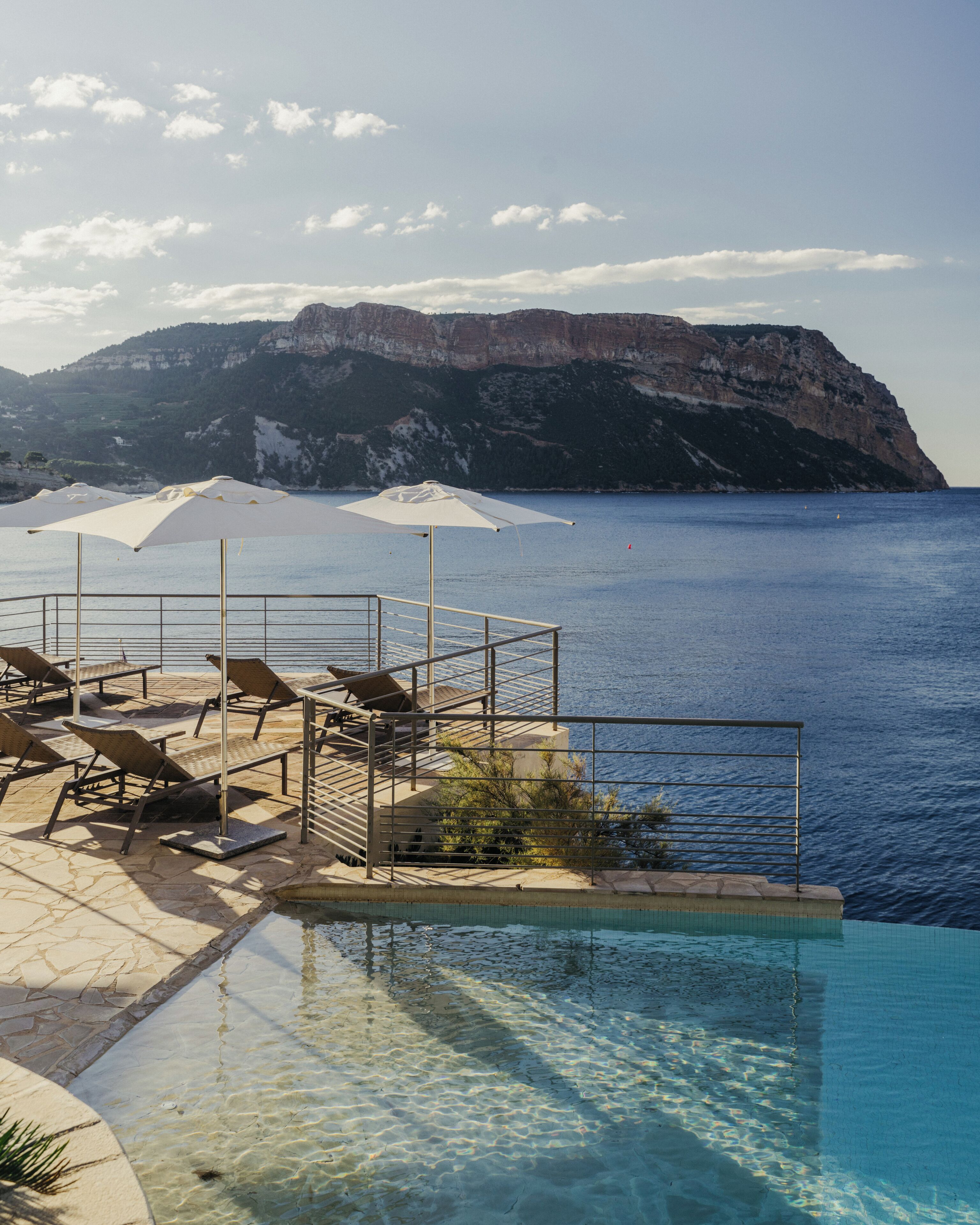 2 outdoor pools, open 9:00 am to 8:00 pm, pool umbrellas, pool loungers