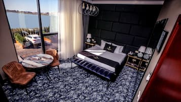 Standard Room, 1 King Bed, Lake View | Premium bedding, in-room safe, soundproofing, iron/ironing board